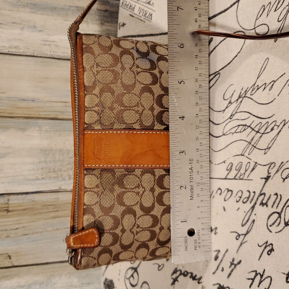 COACH MINI-SIGNATURE COMESTIC BAG